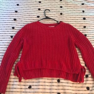 Red knitted sweater